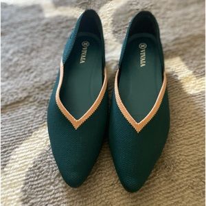 New without tags Vivaia ballet flats in deep teal blue with camel edges.